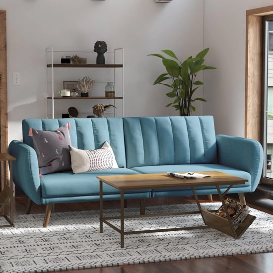 Read more about Brittan linen sofa bed with wooden legs in light blue