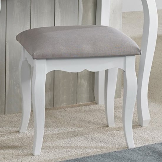 Photo of Brittan wooden dressing stool with grey fabric seat in white