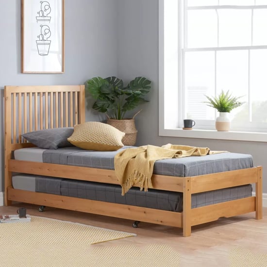 Read more about Broxton rubberwood single bed with guest bed in honey pine