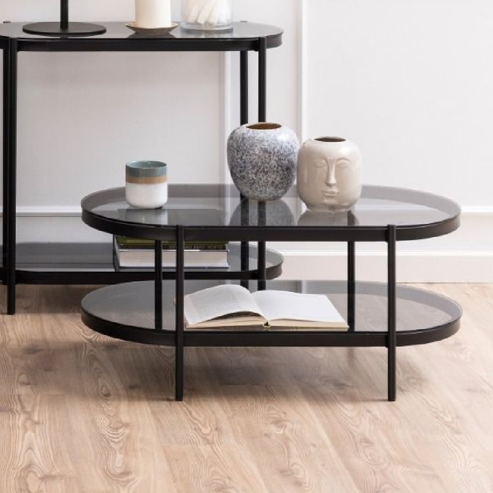 Read more about Bryan smoked glass coffee table oval with black metal frame