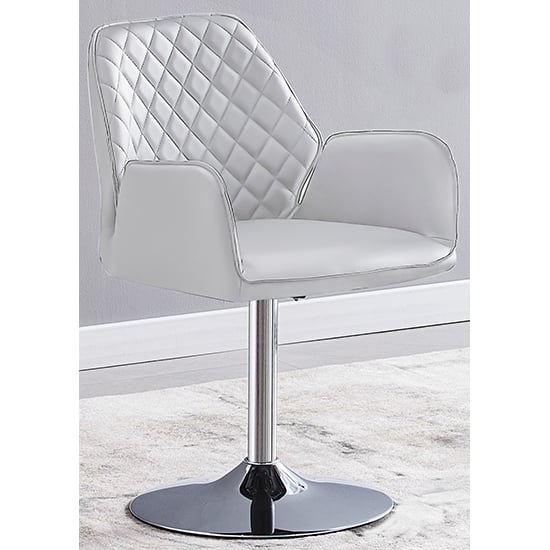 Read more about Bucketeer faux leather dining chair in white with swivel action