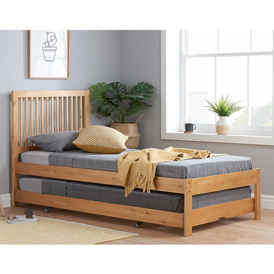 Read more about Buxton rubberwood single bed with guest bed in honey pine