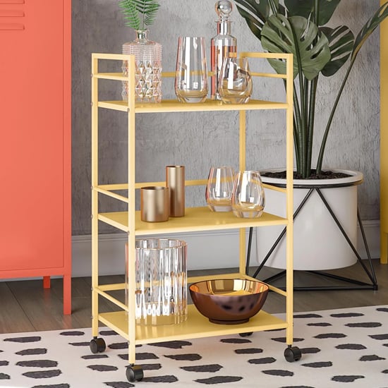 Photo of Caches metal rolling drinks trolley with 3 shelves in yellow