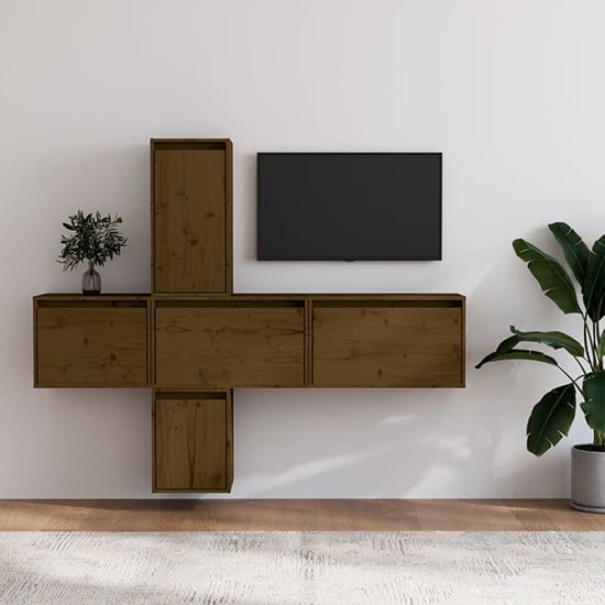 Photo of Cadak solid pinewood entertainment unit in honey brown