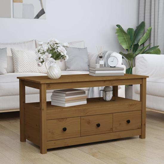 Read more about Cadell pine wood coffee table with 3 drawers in honey brown