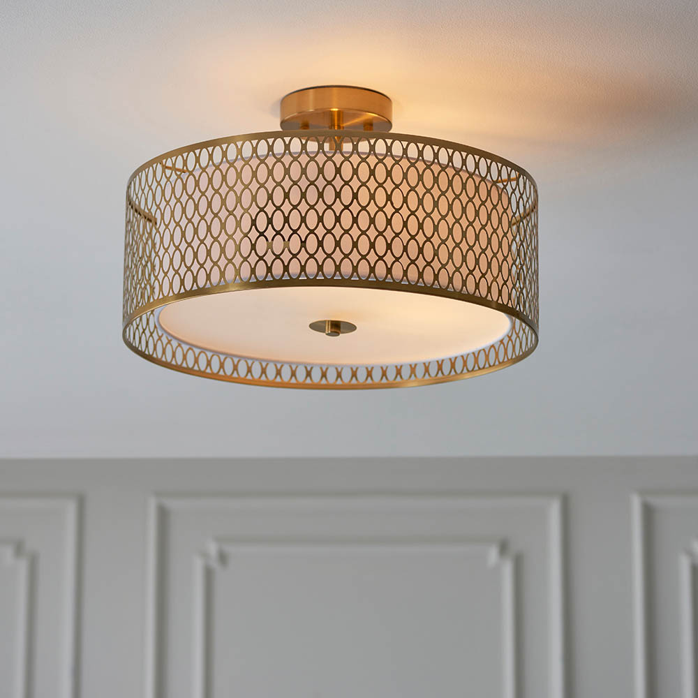 Read more about Cagney 3 light white fabric shade flush light in gold