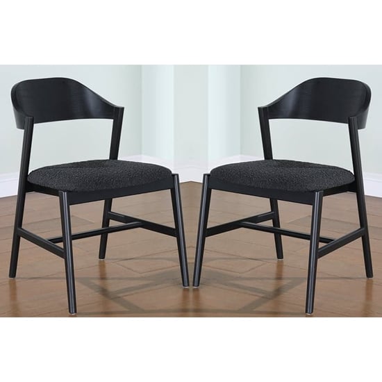 Read more about Cairo black wooden dining chairs in pair