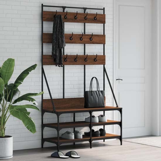 Read more about Camrose wooden clothes rack with shoe storage in brown oak