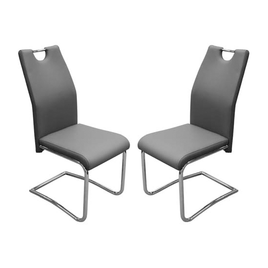 Photo of Capella grey faux leather dining chairs in pair