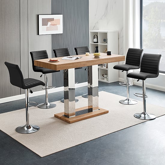 Photo of Caprice large oak effect bar table with 6 ripple black stools