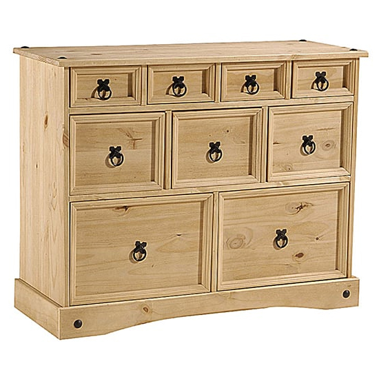 Photo of Carlen wooden chest of 9 drawers in waxed light pine