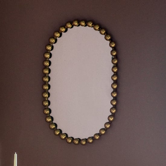 Photo of Carmel rounded rectangle portrait wall mirror in gold frame