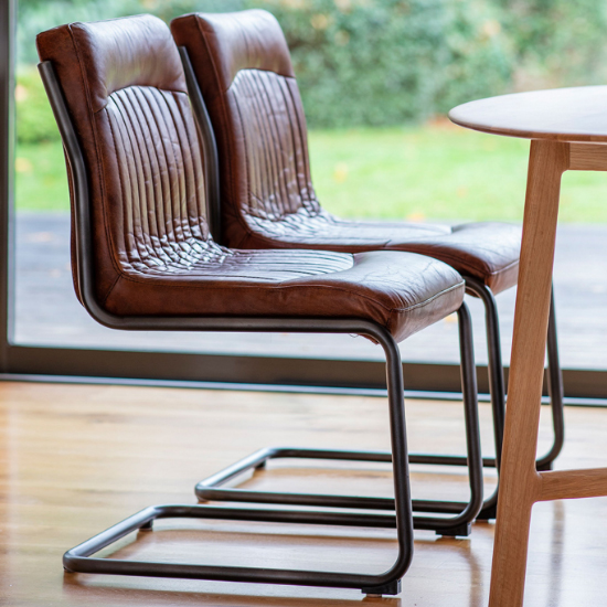 Product photograph of Carpi Brown Leather Dining Chairs With Metal Frame In A Pair from Furniture in Fashion