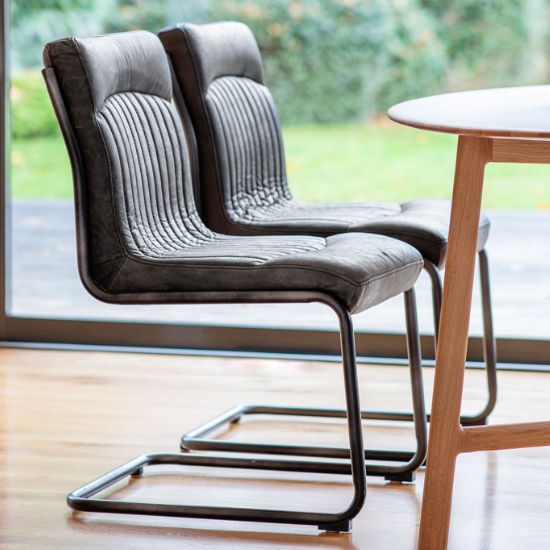 Product photograph of Carpi Ebony Leather Dining Chairs With Metal Frame In A Pair from Furniture in Fashion