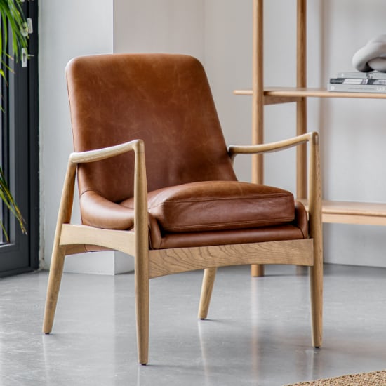 View Carrara leather armchair with wooden frame in brown