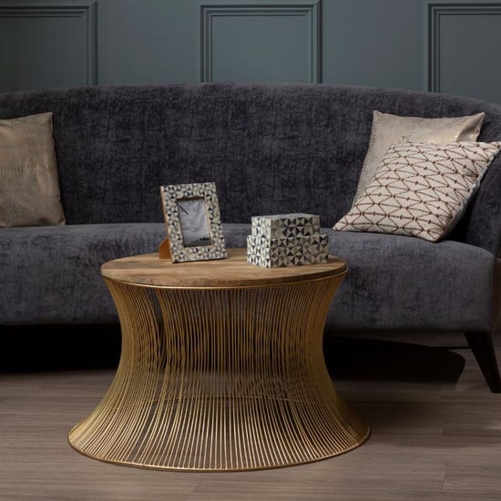 Photo of Casa round wooden coffee table with gold metal frame