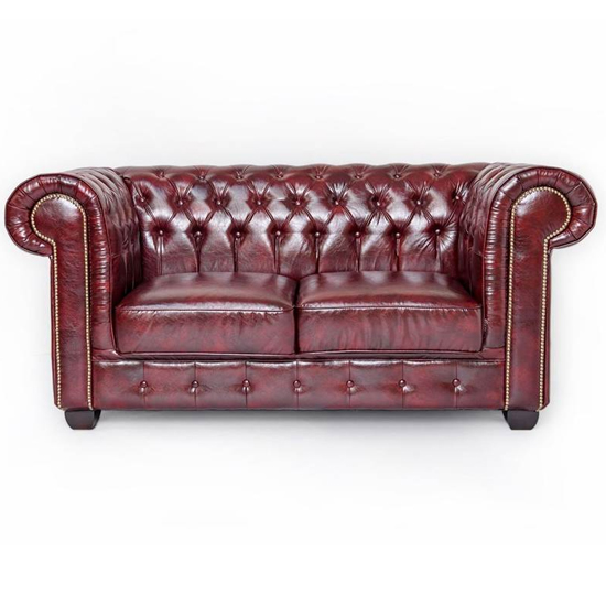 Photo of Caskey bonded leather 2 seater sofa in oxblood red