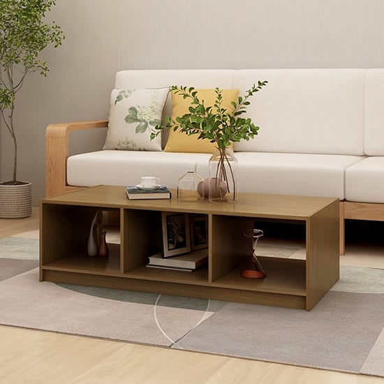 Read more about Cason solid pinewood coffee table with 2 shelves in honey brown