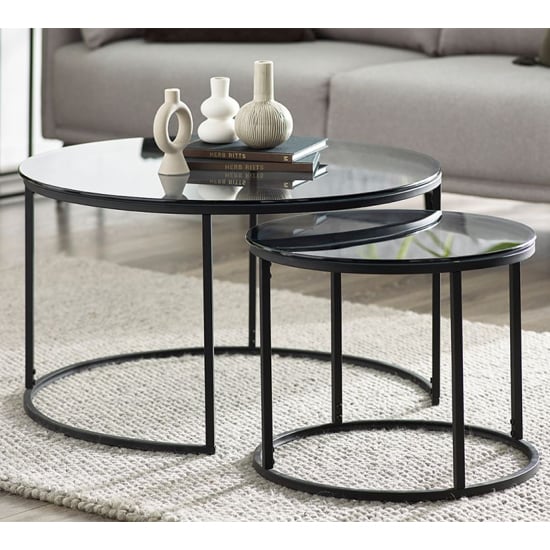 Photo of Casper smoked glass nesting coffee tables with black frame