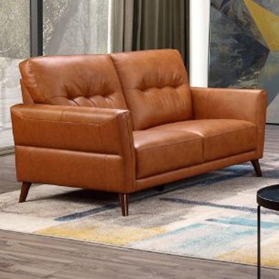 Photo of Celina leather 2 seater sofa in tan with tapered legs