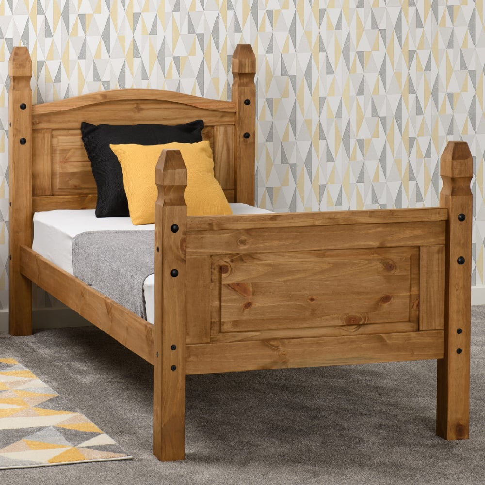 Read more about Central wooden high foot single bed in oak