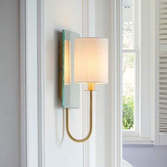 Product photograph of Cerritos Mirrored White Shade Wall Light In Satin Brass from Furniture in Fashion