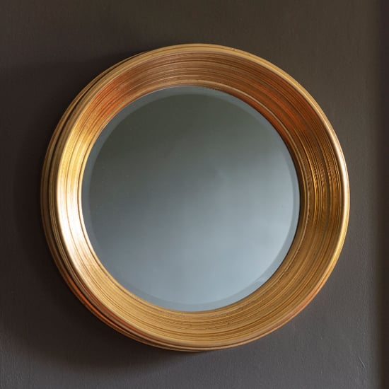 Read more about Cerritos round portrait bevelled wall mirror in gold