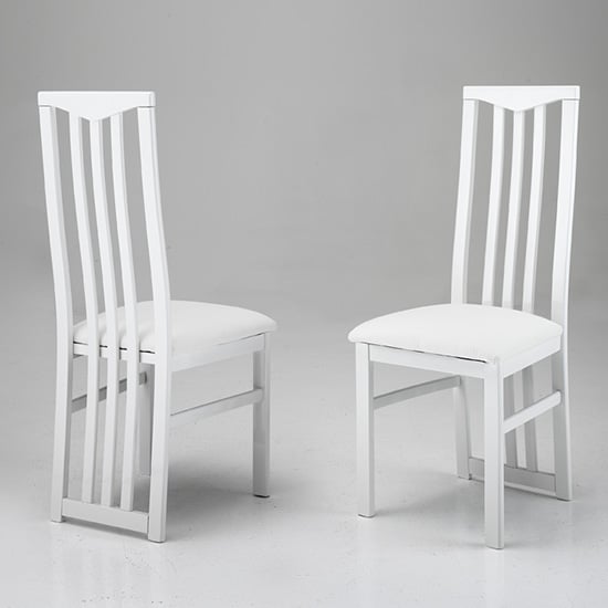 Read more about Cexa white wooden dining chairs in pair