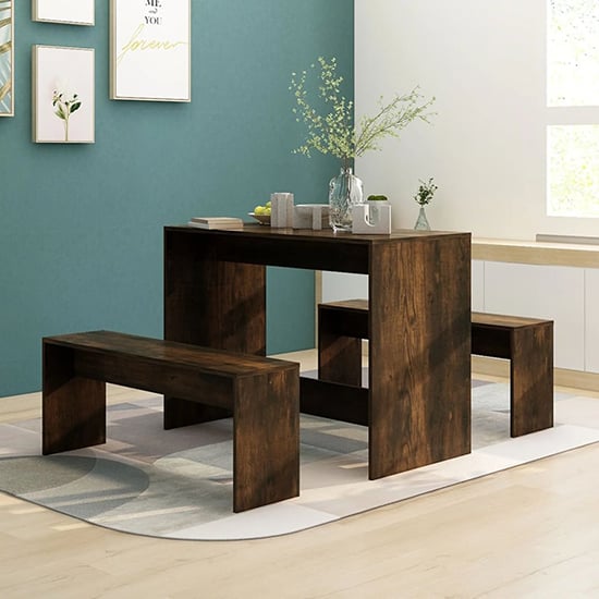 Read more about Ceylon wooden dining table with 2 benches in smoked oak