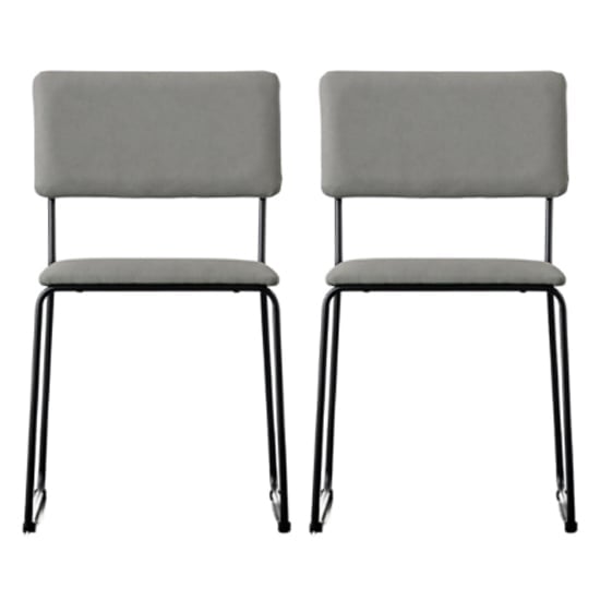 Photo of Chalk light grey fabric dining chairs in a pair