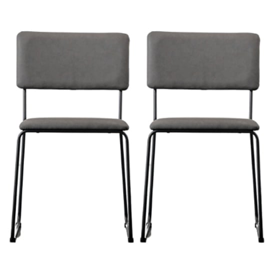 Photo of Chalk slate grey faux leather dining chairs in a pair