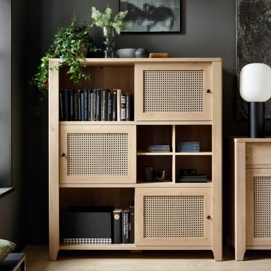 Read more about Cicero highboard with 3 sliding door in oak and rattan effect