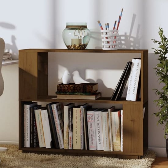 Photo of Ciniod pinewood bookcase and room divider in honey brown