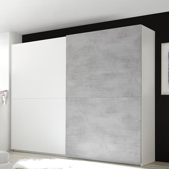 Read more about Civic wide slide door wardrobe in matt white and cement effect