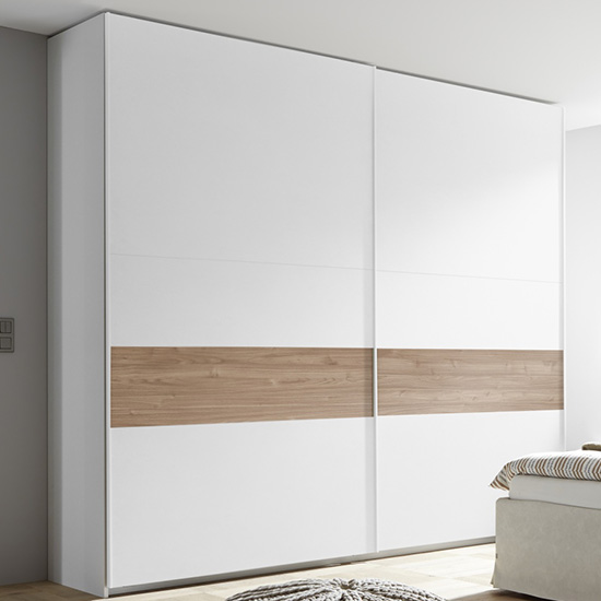 Read more about Civico slide door tall wardrobe in matt white and stelvio walnut