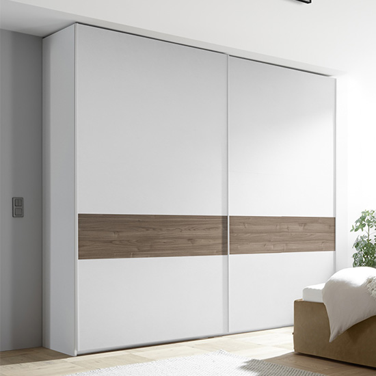 Read more about Civico tall slide door wardrobe in matt white and dark walnut