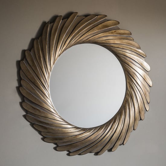 Photo of Claremont contemporary round wall mirror in gold verdigree