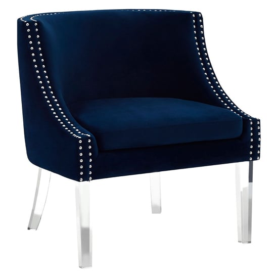 Photo of Clarox upholstered curved velvet armchair in blue