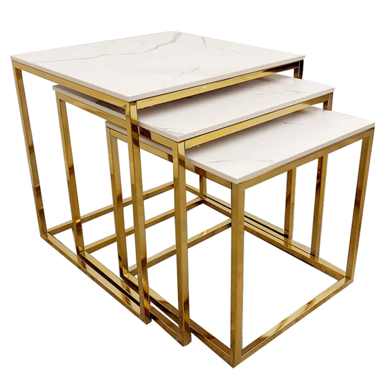 Product photograph of Clive Polar White Sintered Nest Of 3 Tables With Gold Frame from Furniture in Fashion