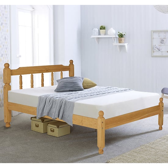 Photo of Coleton spindle wooden king size bed in waxed pine