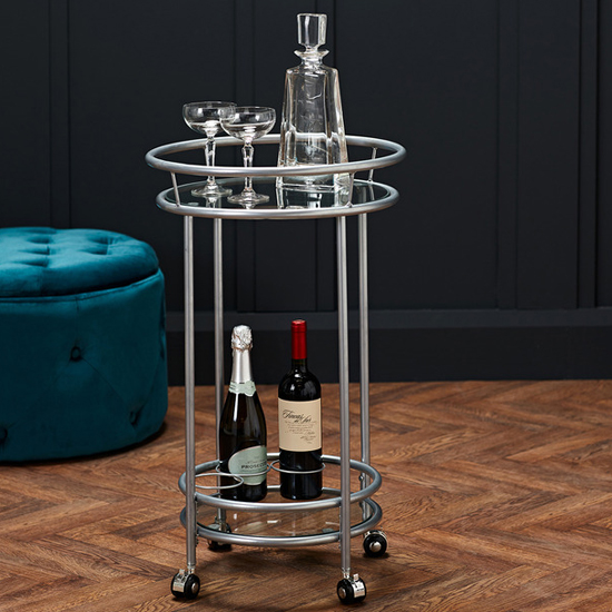 Read more about Colin round glass shelves drinks trolley with silver frame