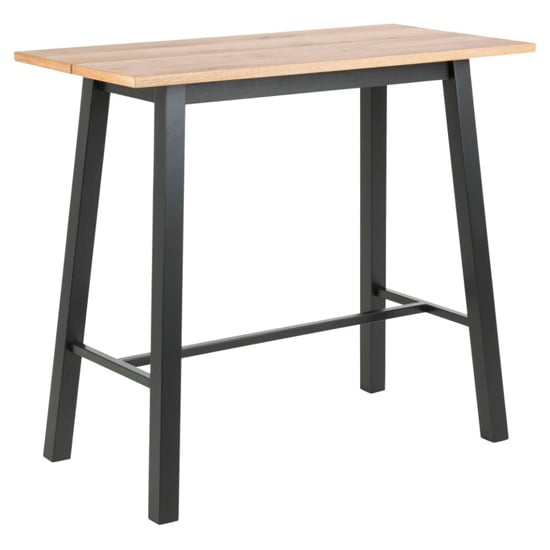 Read more about Colza wooden bar table with black metal legs in wild oak