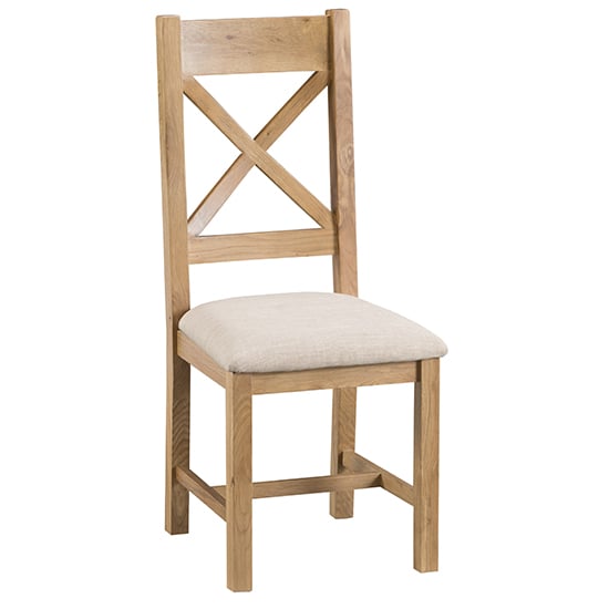 Photo of Concan cross back fabric seat dining chair in medium oak