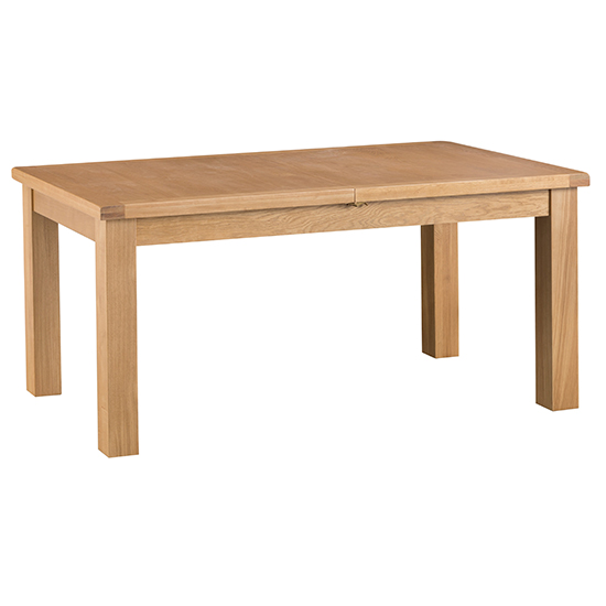 Photo of Concan extending 170cm butterfly dining table in medium oak