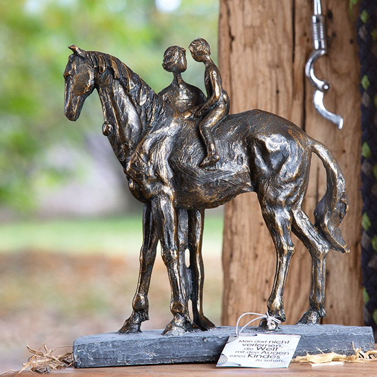 Photo of Confidence poly design sculpture in antique bronze and grey