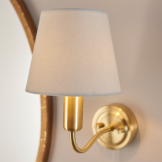 Photo of Conway ivory fabric shade wall light in satin brass