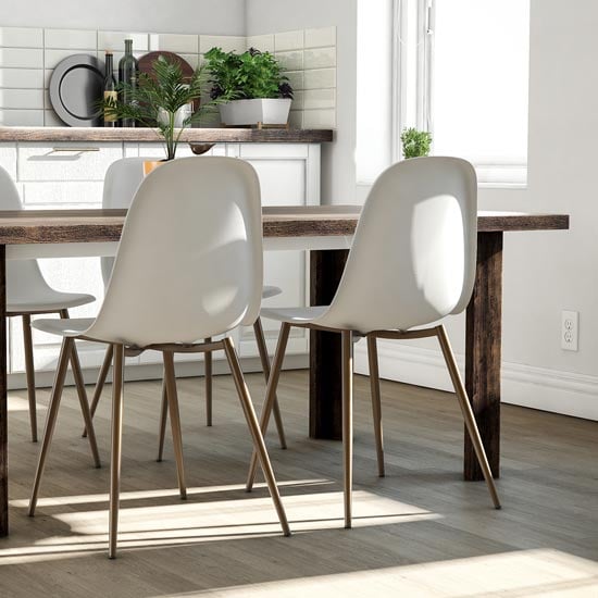 Photo of Couplie white plastic dining chairs with metal frame in pair