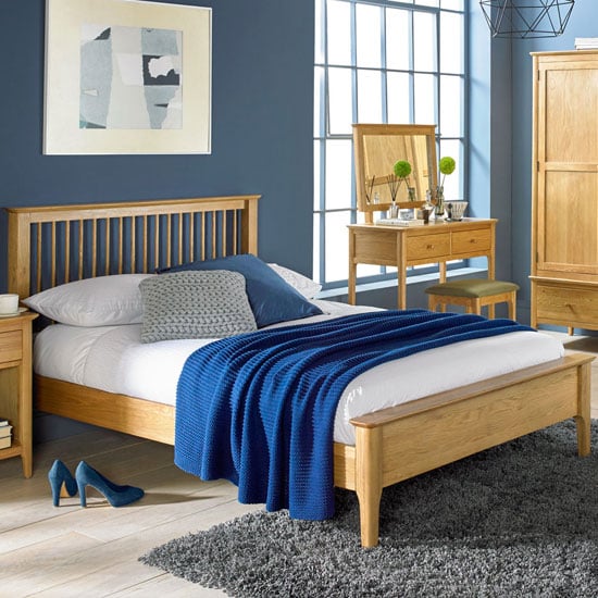 Read more about Courbet wooden king size low foot bed in light solid oak