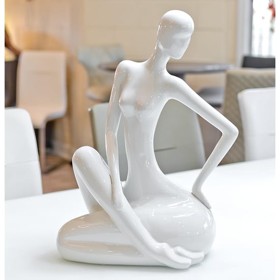 Product photograph of Courson Ceramic Lady Sitting Sculpture In White from Furniture in Fashion