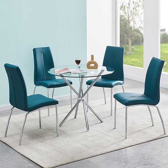 Photo of Criss cross glass dining table with 4 opal teal chairs